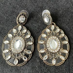 Gold/black Earrings with clear rhinestones.